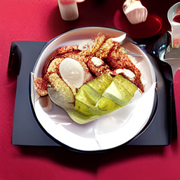 A photograph of a plate of Bánh Xèo, generated by AI