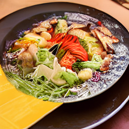 A photograph of a plate of Bibimbap, generated by AI