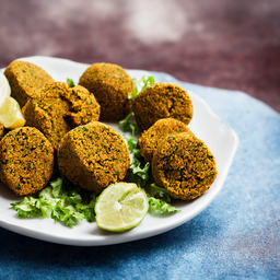 A photograph of a plate of Falafel, generated by AI