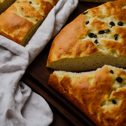 A photograph of a plate of Focaccia Bread, generated by AI