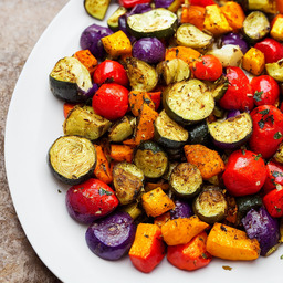 A photograph of a plate of Greek-style Roasted Vegetables, generated by AI