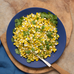 A photograph of a plate of Mexican Street Corn Salad, generated by AI