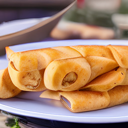 A photograph of a plate of Spanakopita, generated by AI